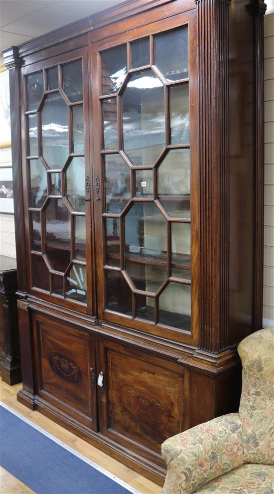 A glazed walnut bookcase, H.245cm